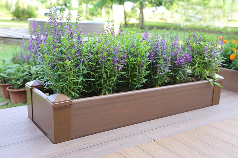 Composite raised garden beds and planters